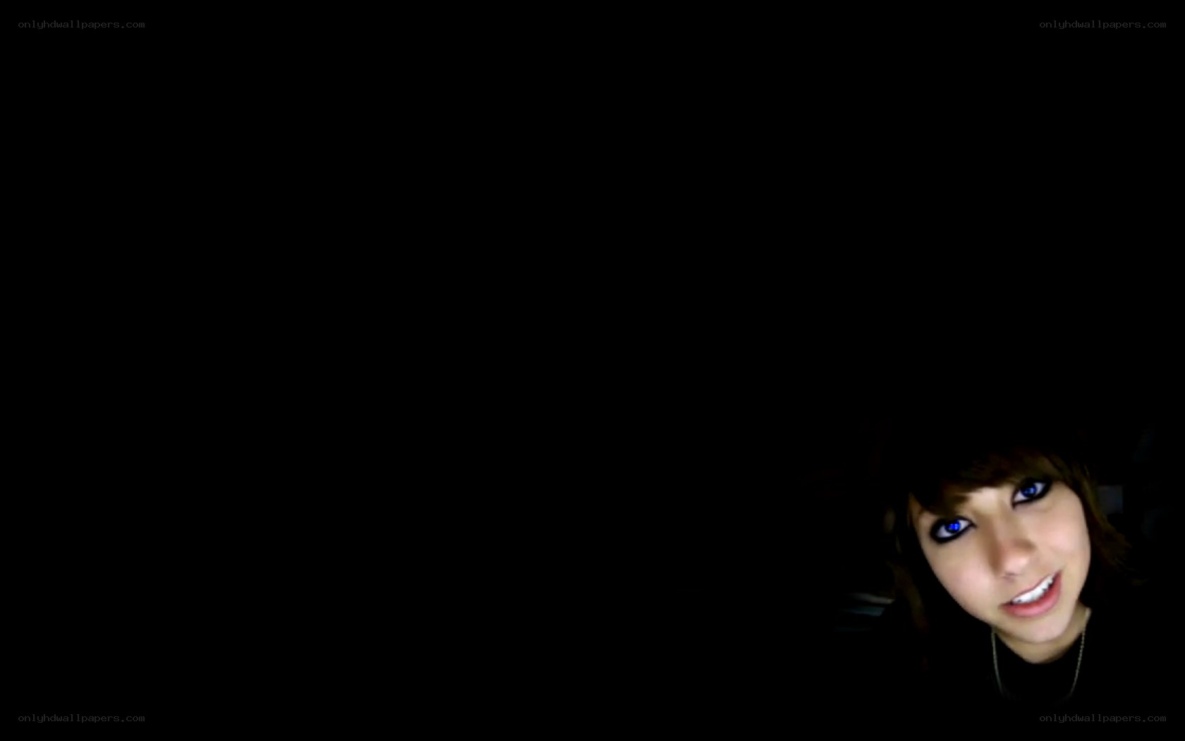 person in dark room