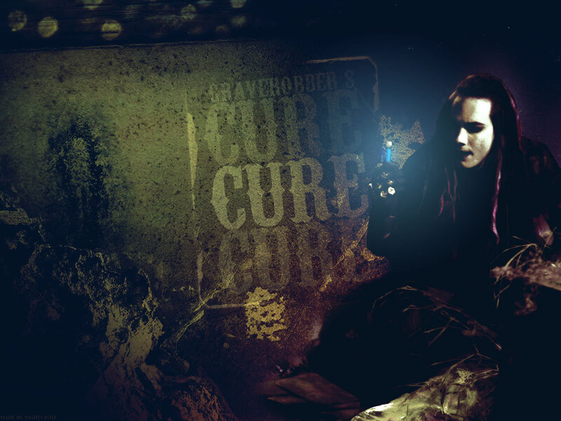 person in dark setting with text