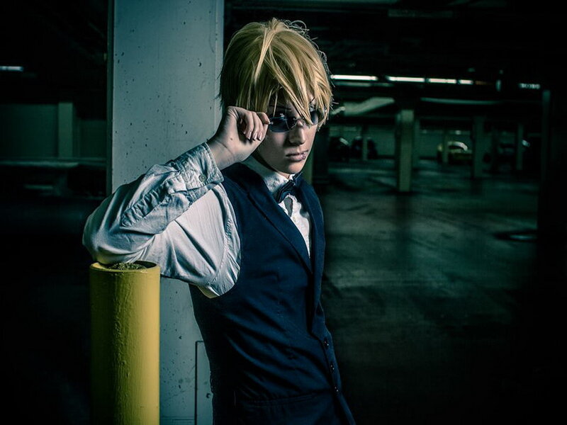 Person in Dark Suit — Black, Dramatic