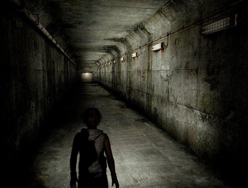 person in dark tunnel