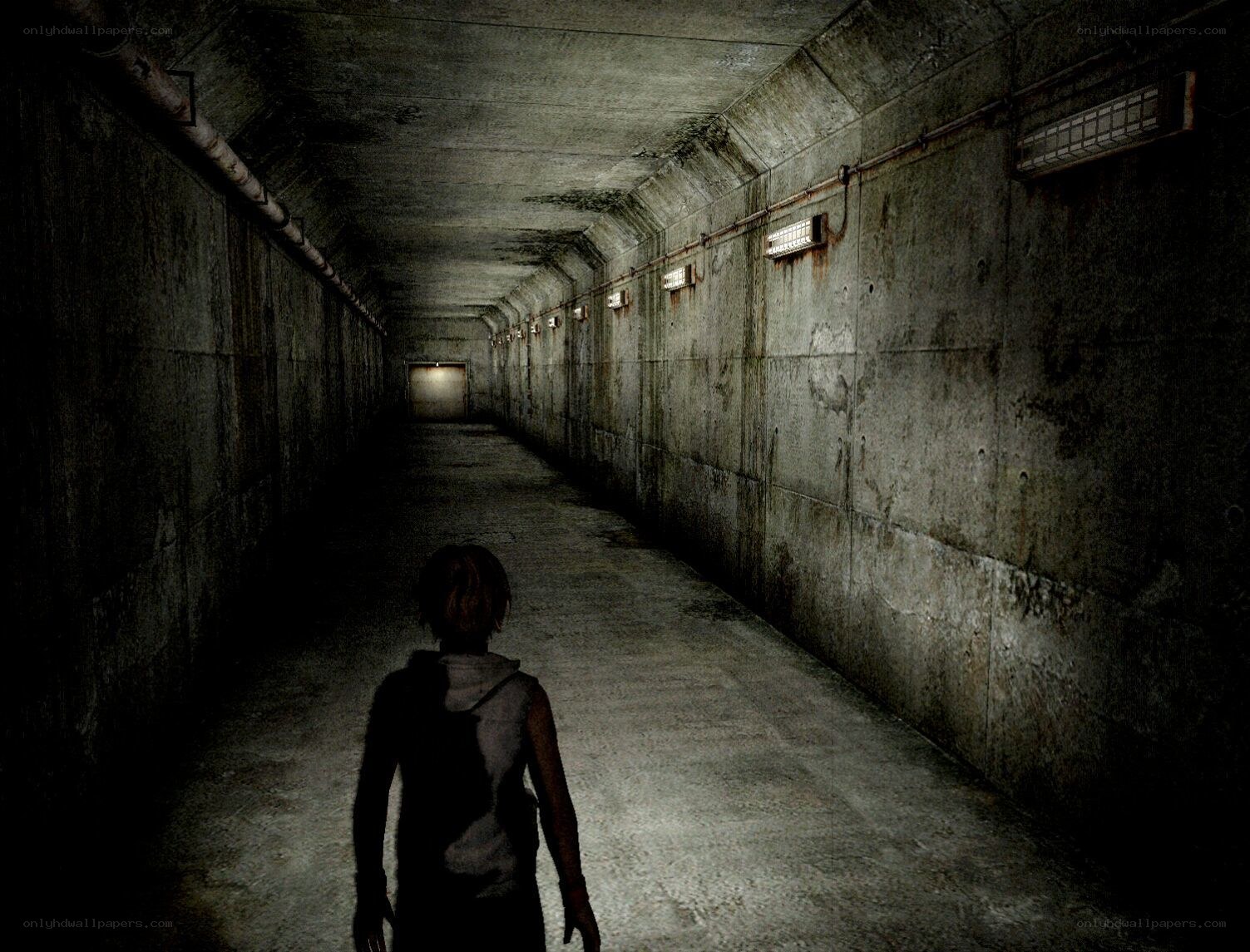 person in dark tunnel