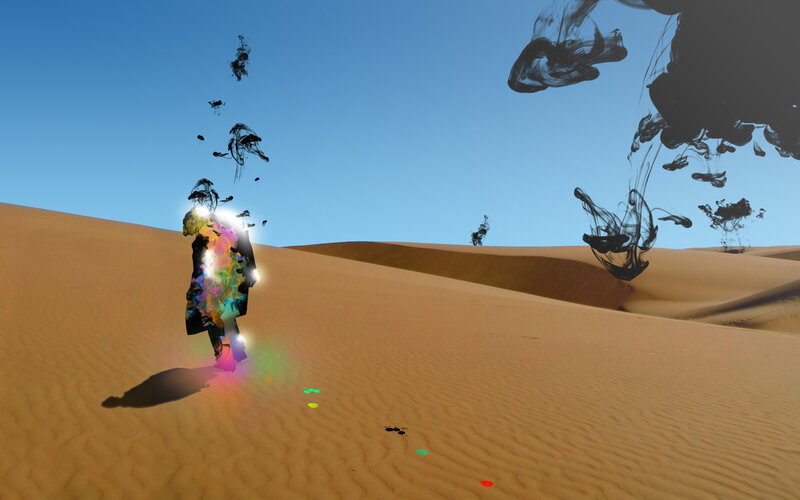 person in desert with colorful aura