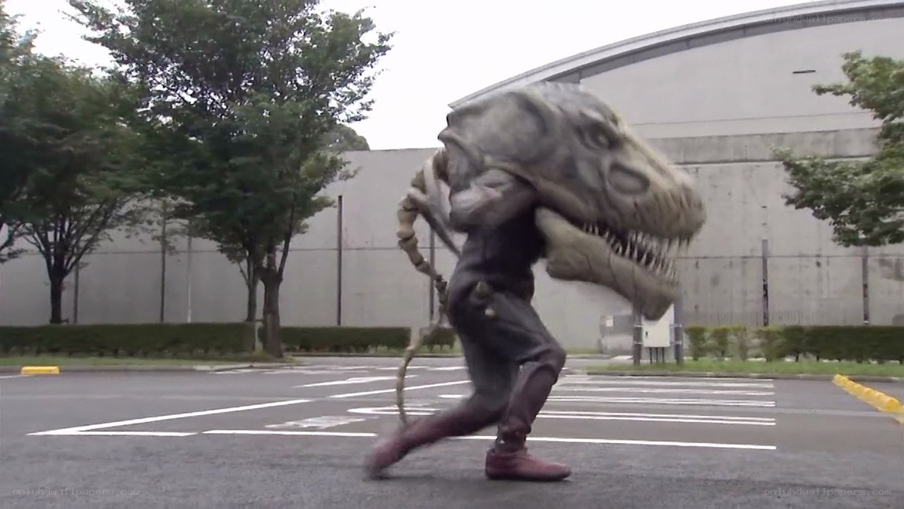 person in dinosaur costume running