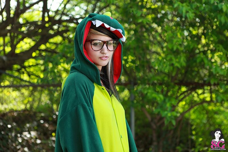 person in dinosaur onesie
