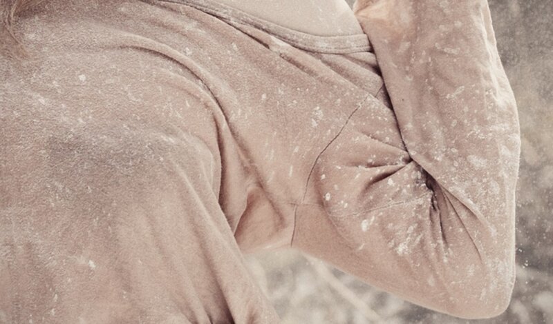 person in dusty clothing