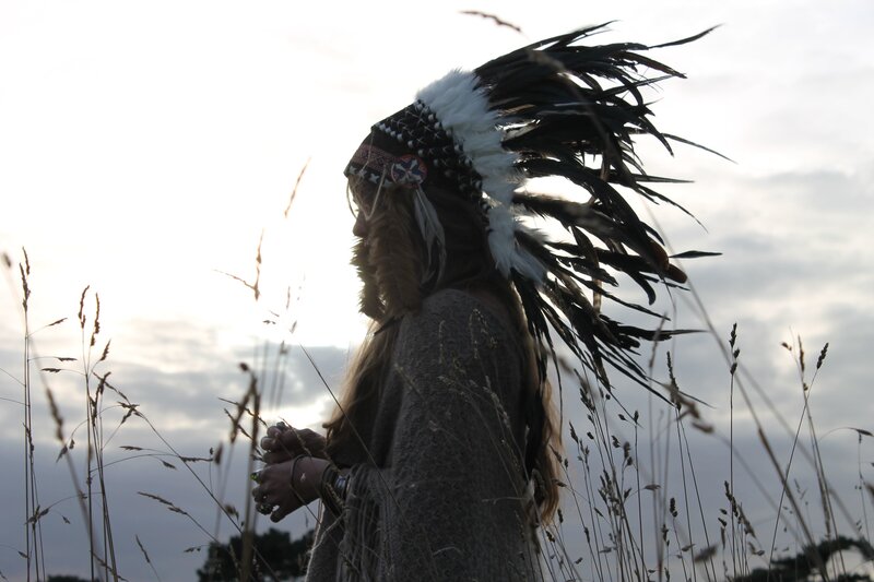Person in Feathered Headdress — Gray