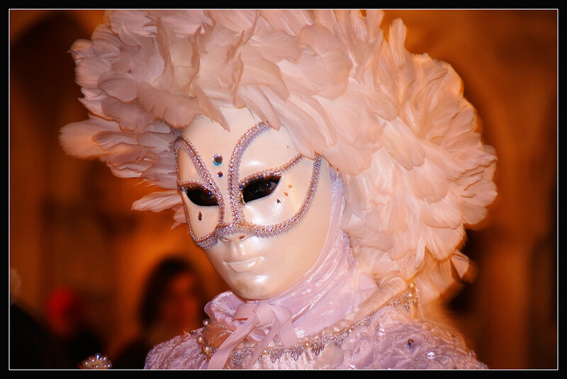 Person in Feathered Mask