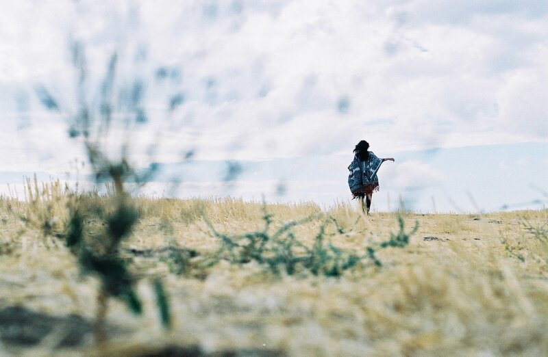 Person in Field — Blue