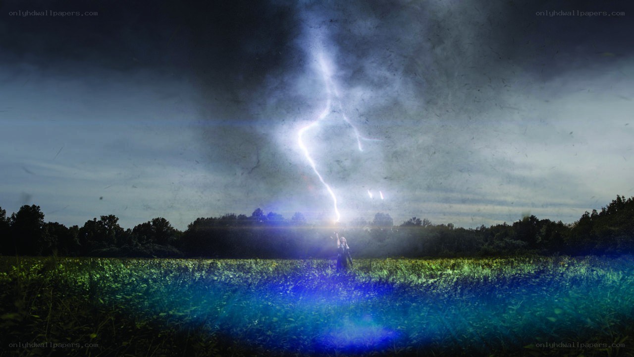 Person in field during lightning storm