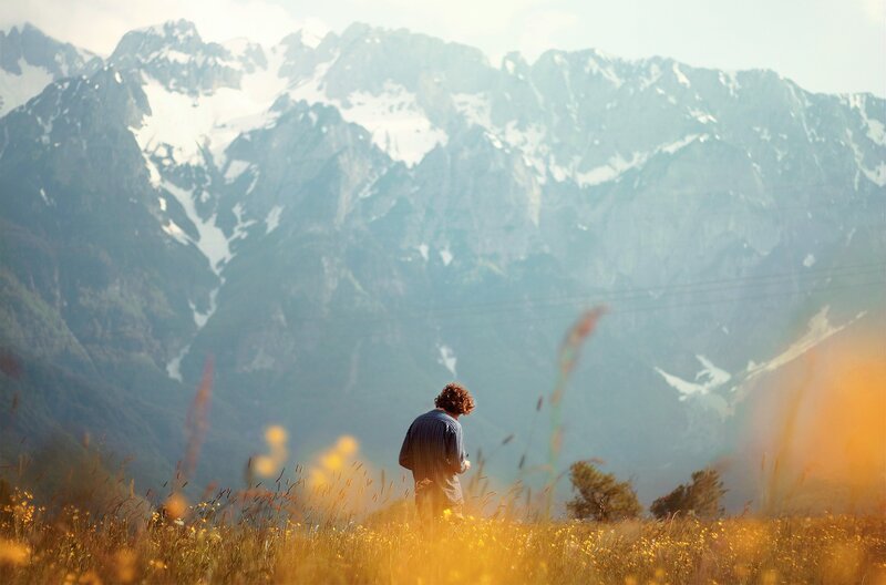 Person in Field — Yellow