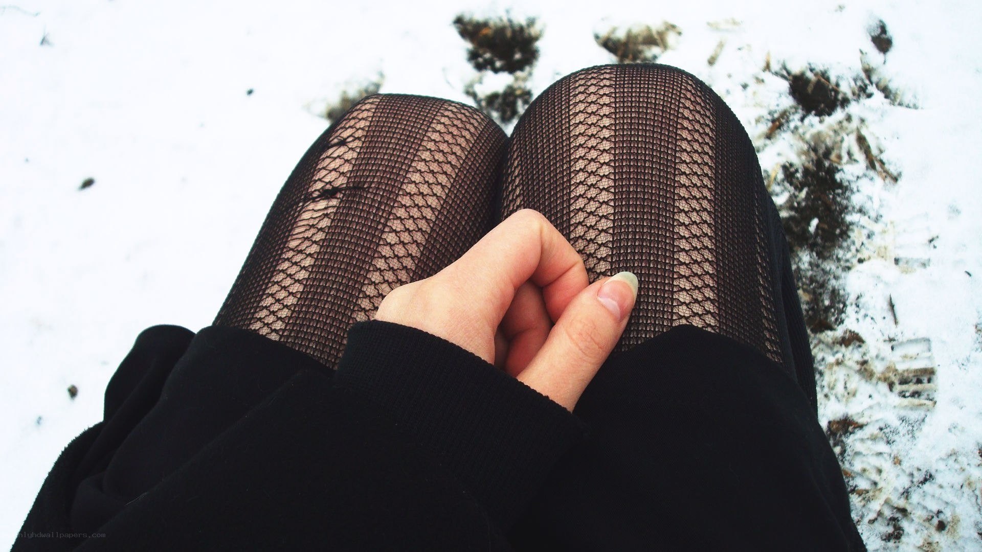 person in fishnet tights