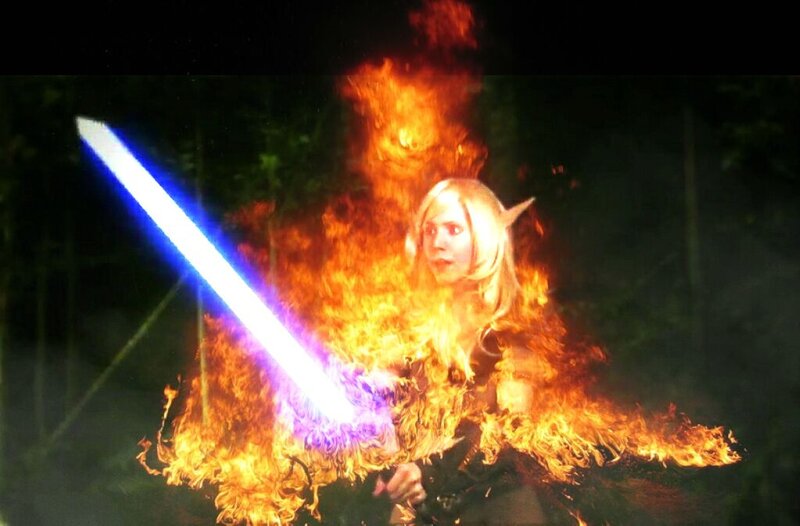 Person in Flames with Sword