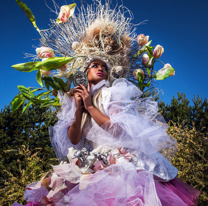 Person in Floral Costume — White