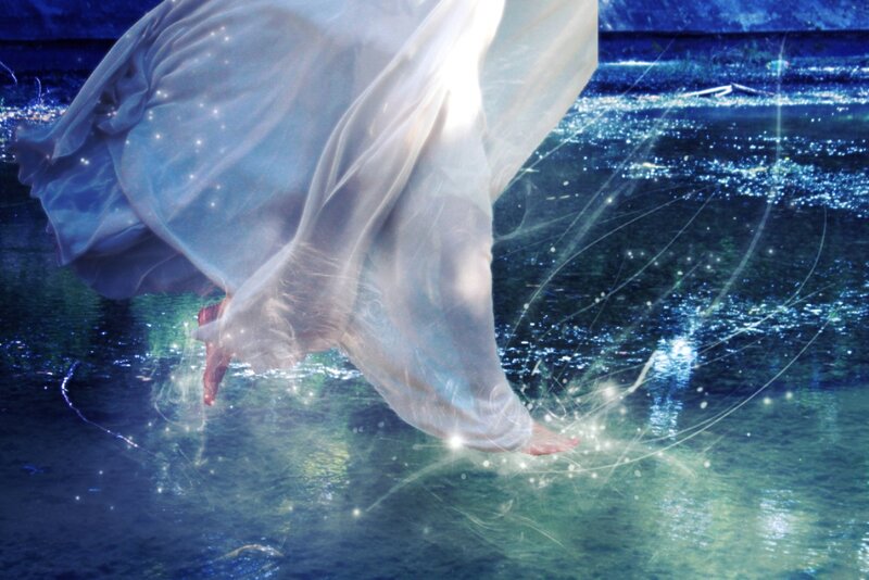 Person in Flowing White Dress