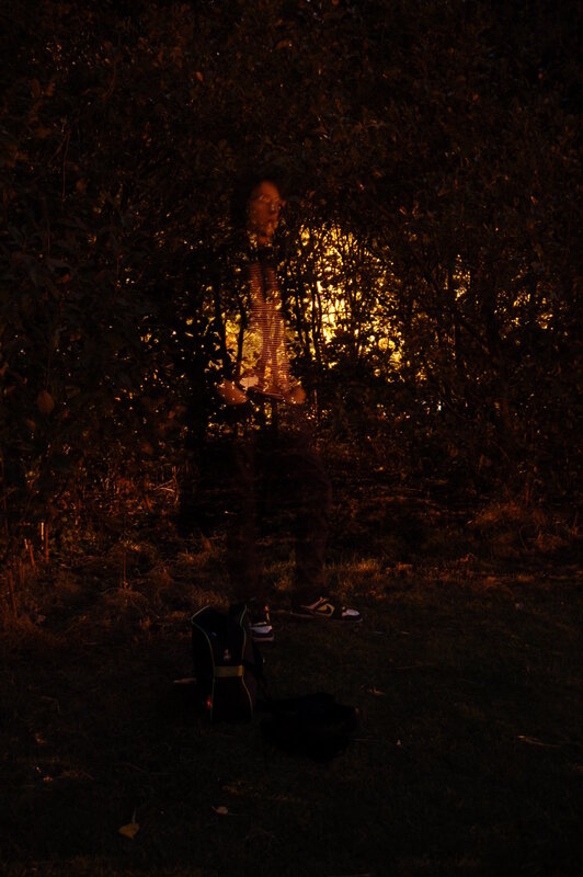 person in forest at night