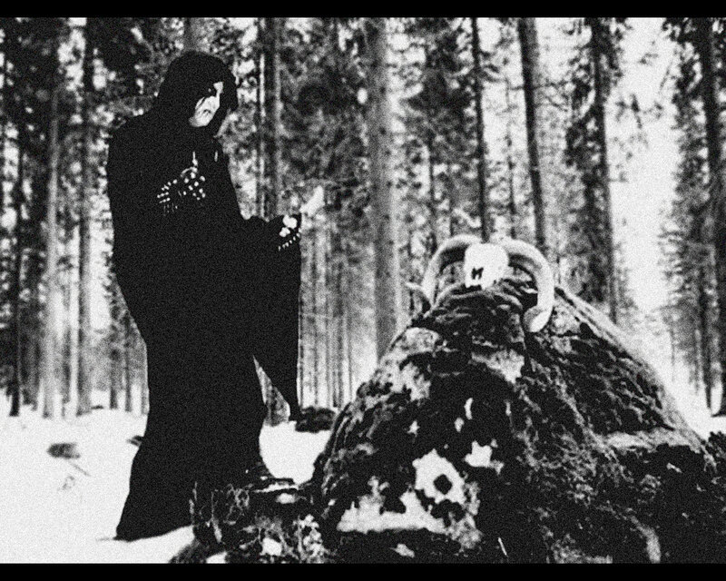 person in forest with skull