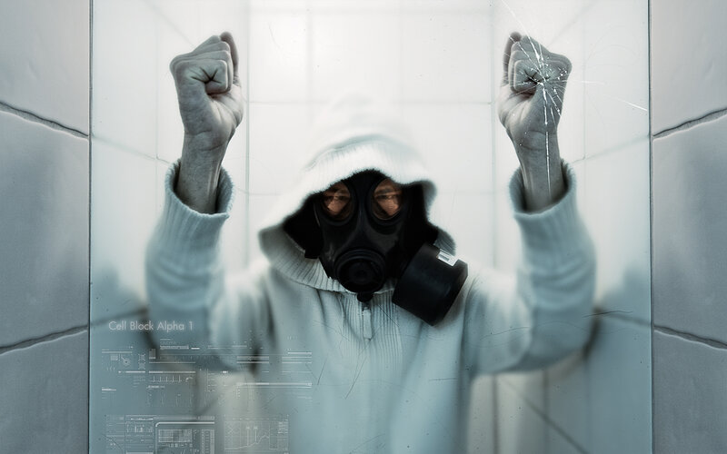 person in gas mask behind glass