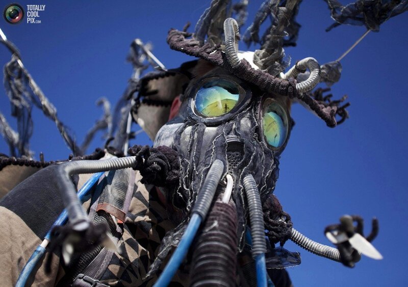 person in gas mask costume
