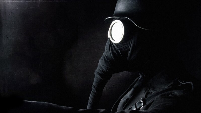 Person in Gas Mask — Dark Room