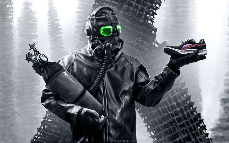 person in gas mask holding sneaker