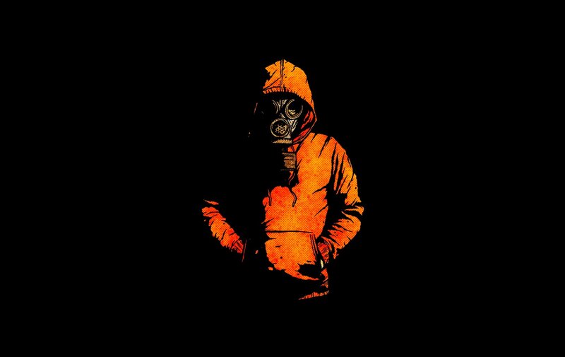 person in gas mask hoodie
