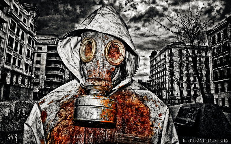 person in gas mask in city