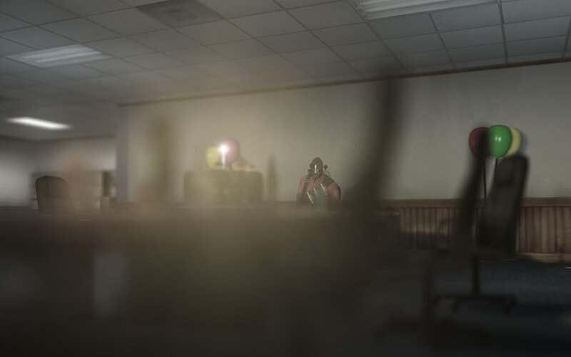 person in gas mask in office