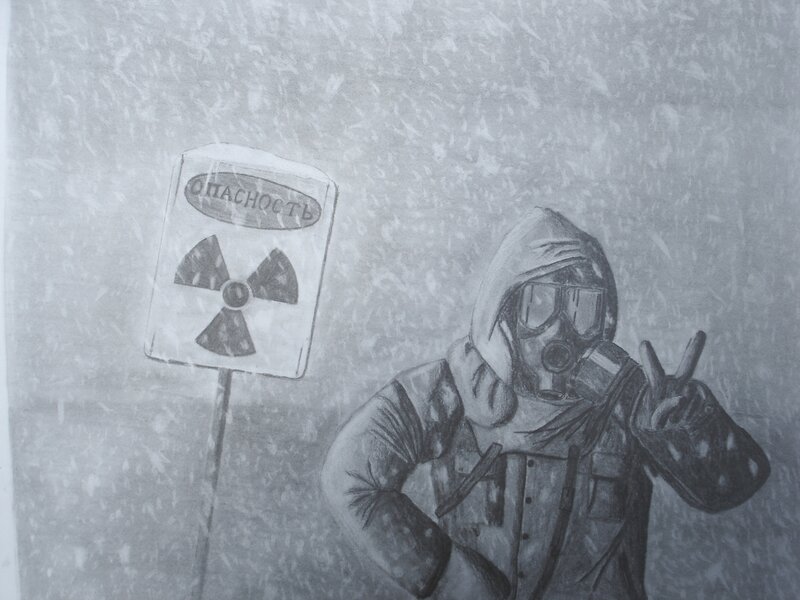 person in gas mask near radiation sign