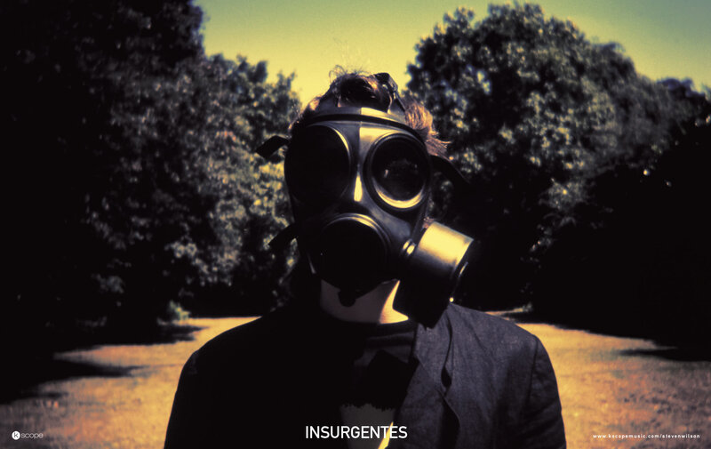 person in gas mask outdoors