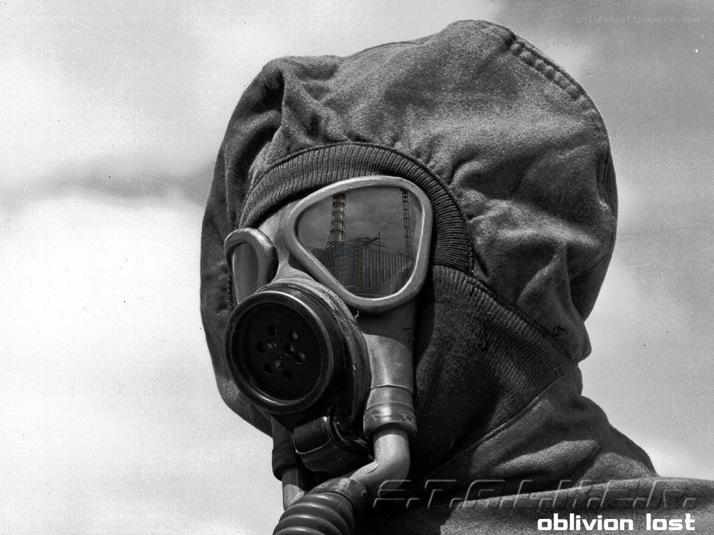 person in gas mask with Chernobyl reflection