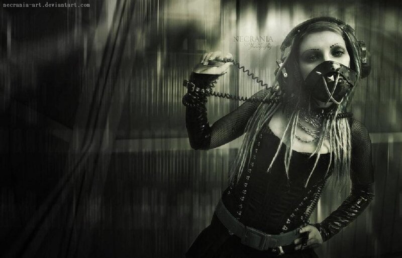 person in gas mask with dreadlocks