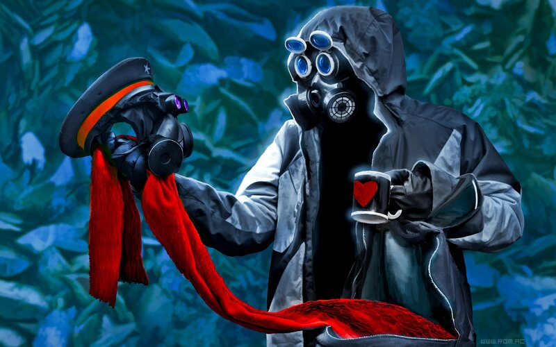 person in gas mask with red scarf