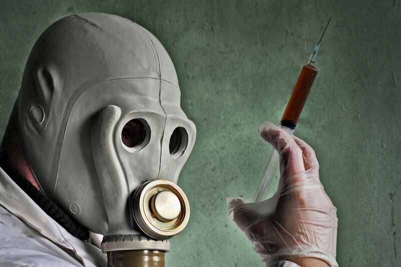 person in gas mask with syringe