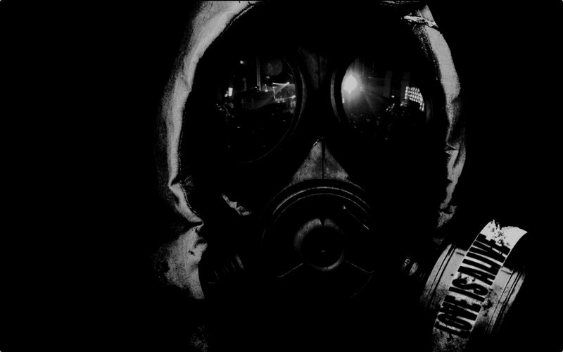 person in gas mask with text