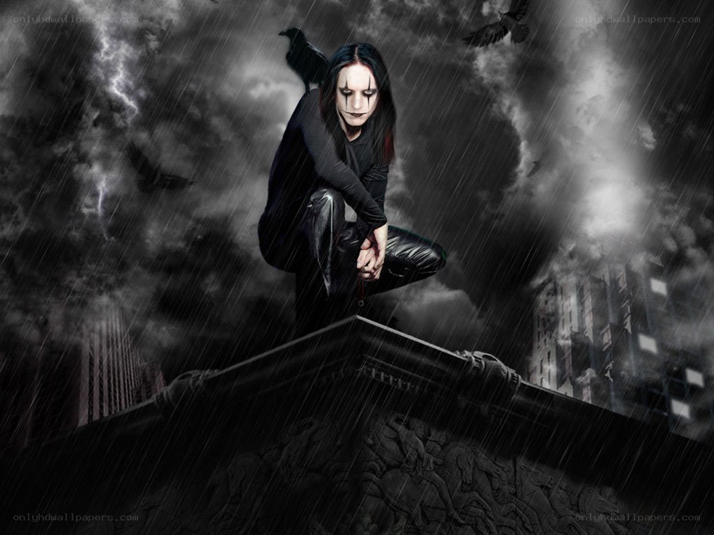 person in gothic makeup on rooftop