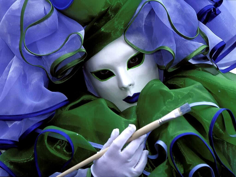 person in green and purple costume