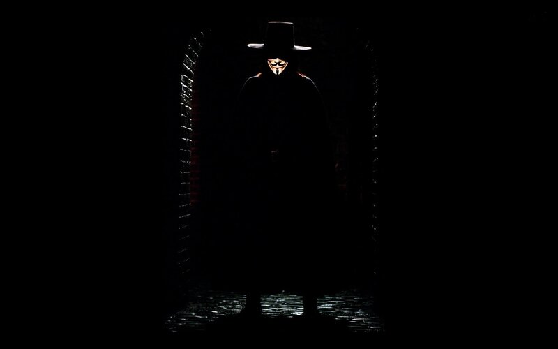 Person in Guy Fawkes Mask — Black, Dramatic, Night, Photograph, Hat