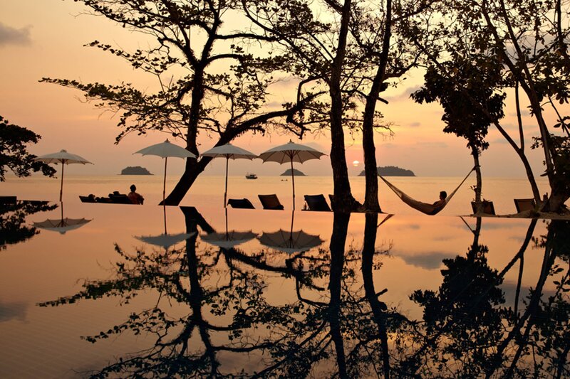 Person in Hammock at Sunset — Orange, Serene