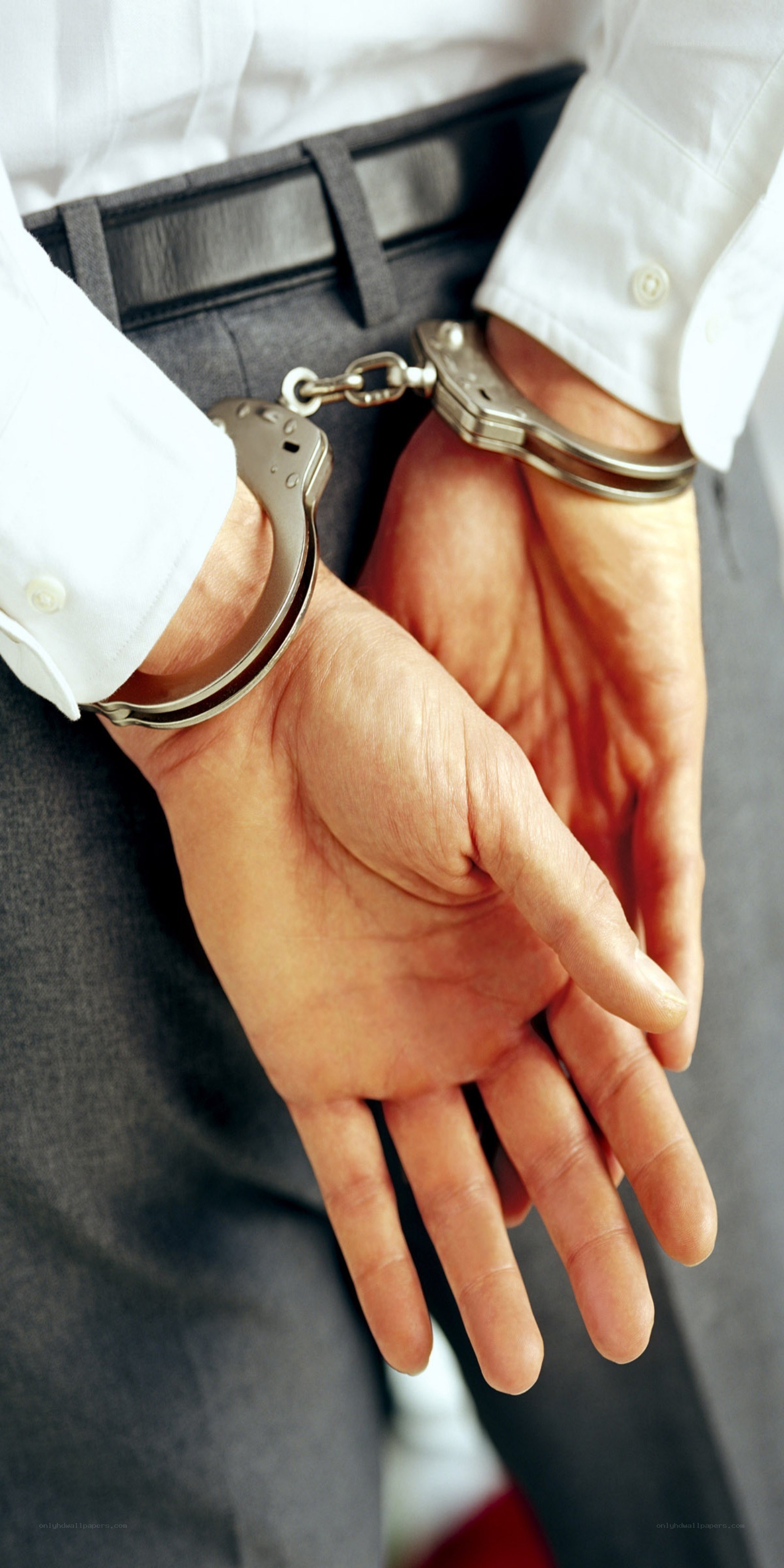 Person in handcuffs