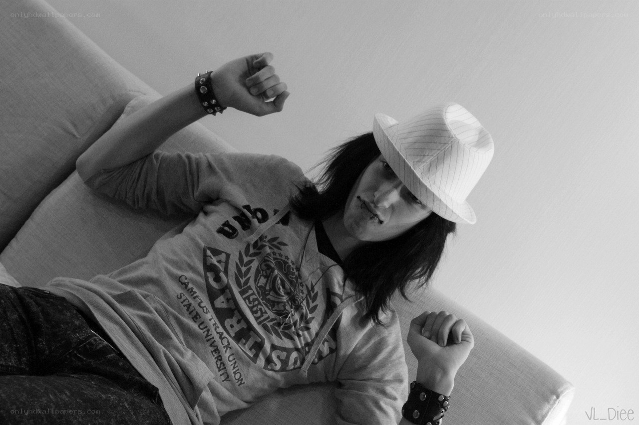 person in hat on couch