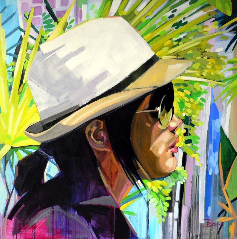 person in hat with tropical plants
