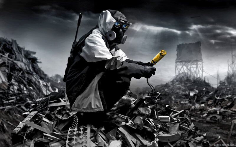 person in hazmat suit on rubble