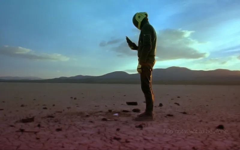 person in helmet on desert