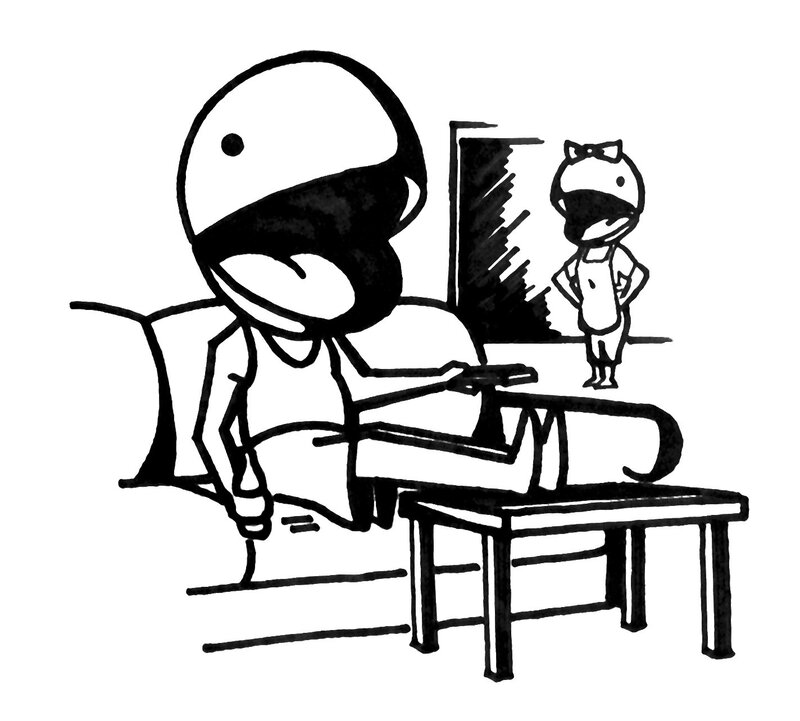 person in helmet sitting at table