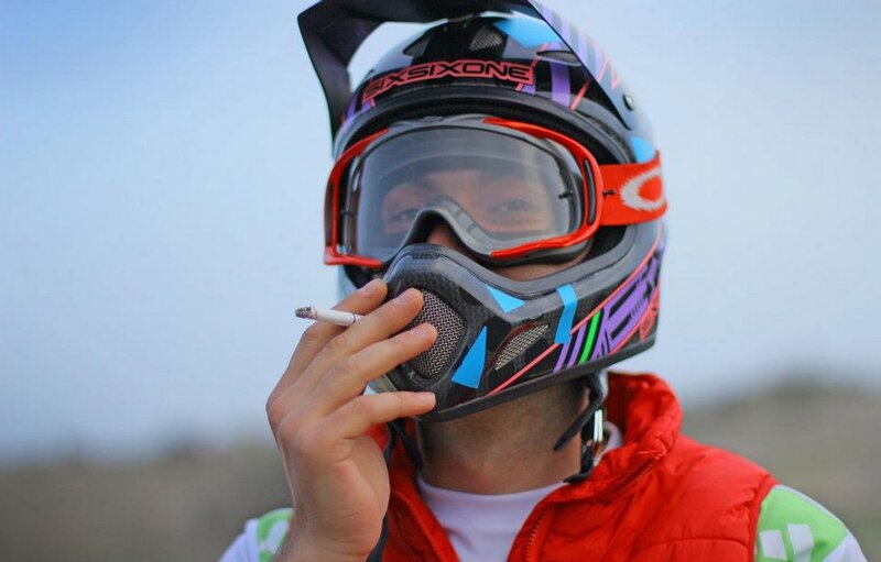 Person in Helmet Smoking
