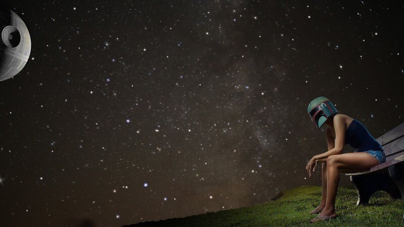 Person in helmet under stars