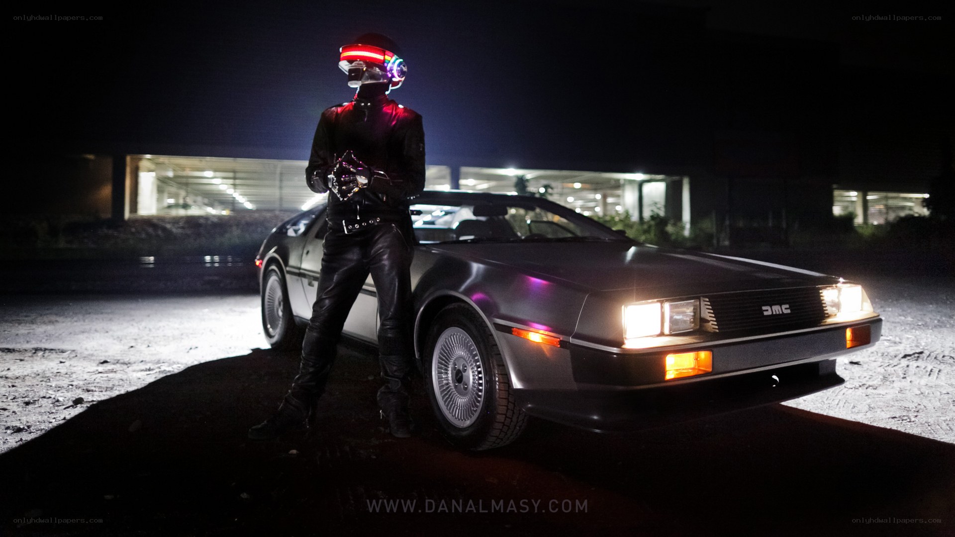 person in helmet with car