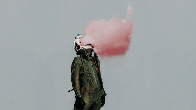 Person in Helmet with Smoke