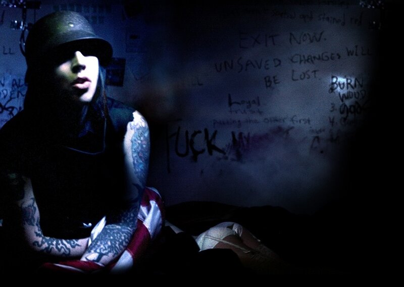 person in helmet with tattoos
