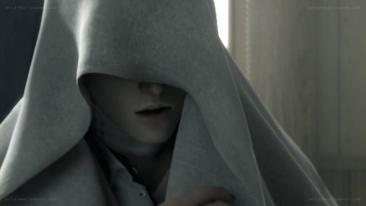 person in hooded cloak